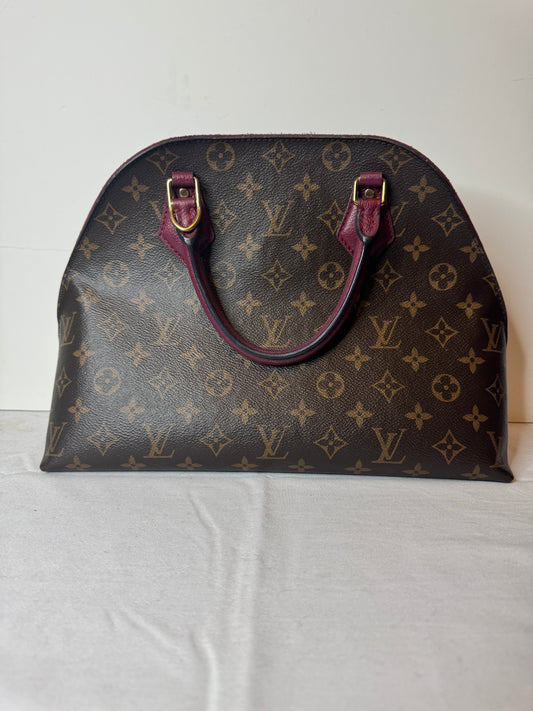 Louis Vuitton brown monogram bag with burgundy handles and hanging burgundy detail