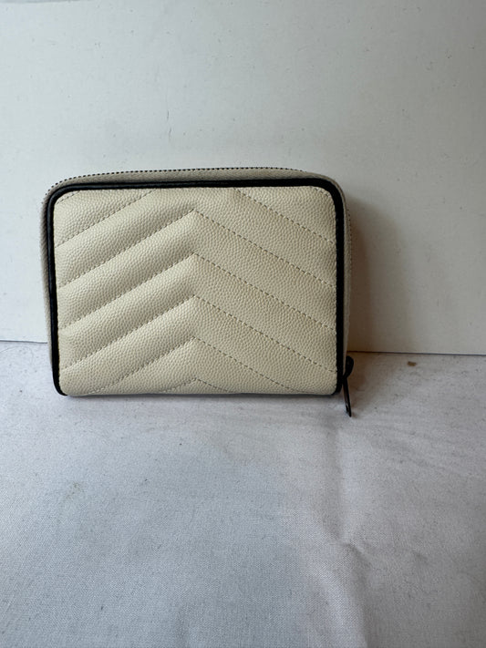 Front of ivory chevron quilted wallet with black YSL monogram