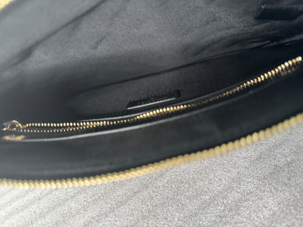 Interior detail of black clutch