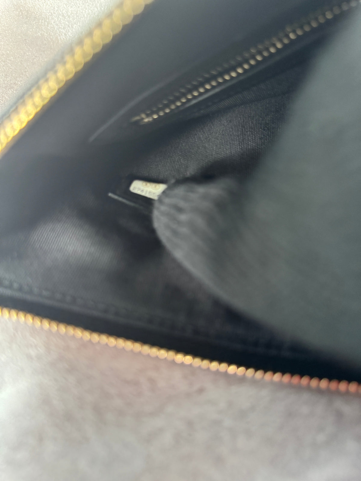 Close-up of interior zip pocket